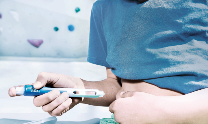 A man injecting himself with medication using a syringe