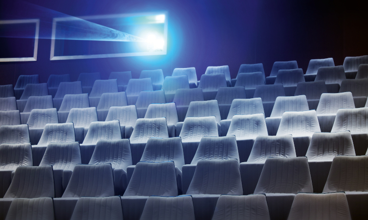 Focused light from a digital projector inside a movie theater