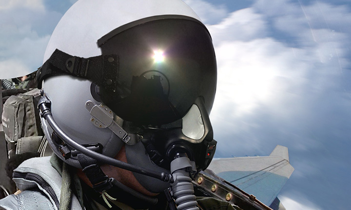 Military pilot in cockpit of aircraft