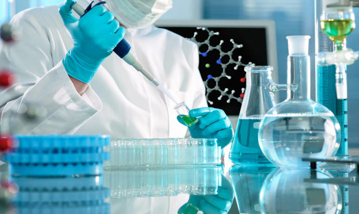 A scientist using DURAN® borosilicate glass tubing in a laboratory