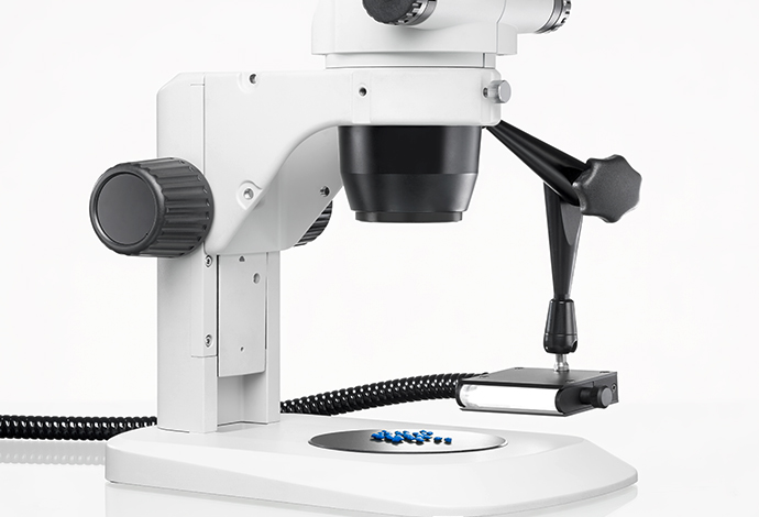White microscope with a fiber optic line light