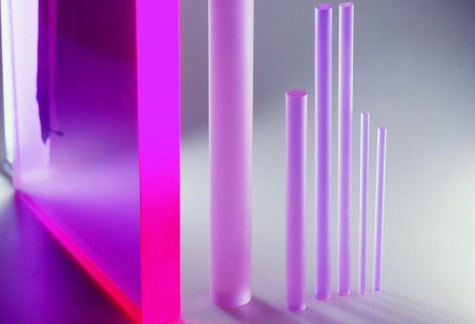 Purple laser glass sheets and rods standing up	
