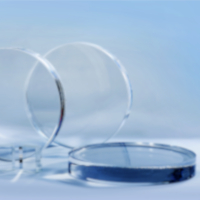 Two clear high homogeneity glass discs made by SCHOTT for high-power lasers and satellite technology