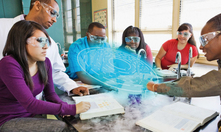 Group of students in a classroom learning using augmented reality technolog