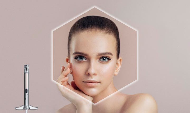 Female face staring at camera with SCHOTT TOPPAC® syringe in foreground