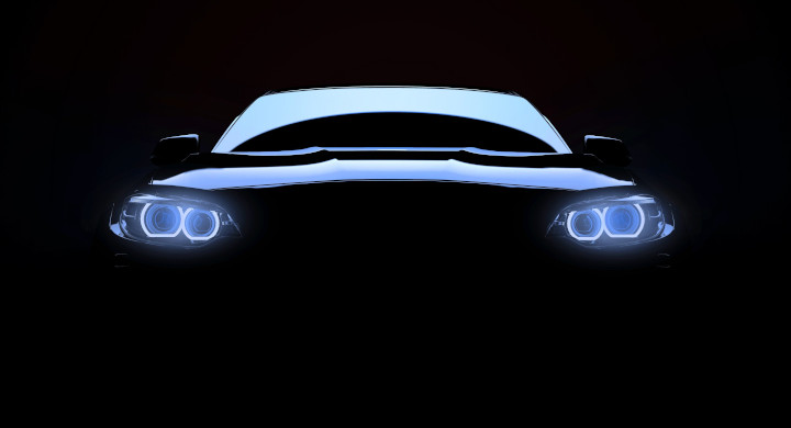 SCHOTT manufacture glass materials and components for automotive lighting, safety and electronics packaging Front view of a luxury vehicle with headlights on