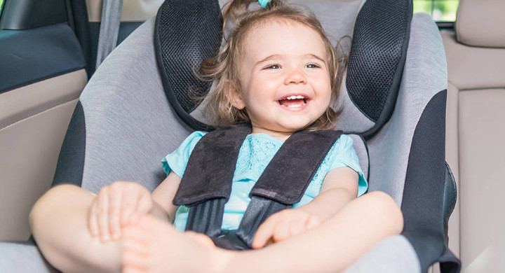 SCHOTT produces a range of components that improves the performance of vehicle safety systems Small baby in a child seat in the back of a luxury vehicle