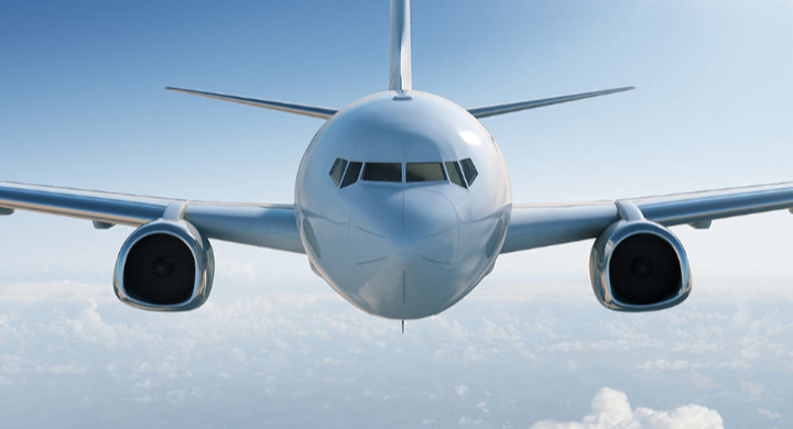 SCHOTT's glass, fiber optic and LED products are specially developed for the aviation industry Front view of an aircraft in a blue sky