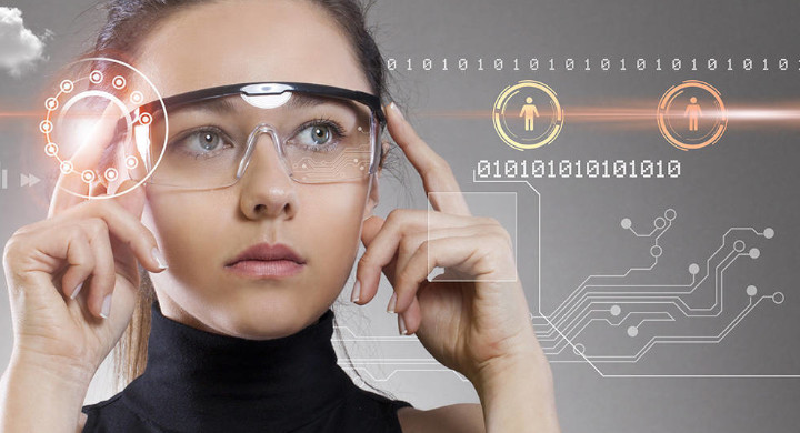 SCHOTT optical glass used for augmented reality technology Young female wearing augmented reality glasses looking at computer-generated information