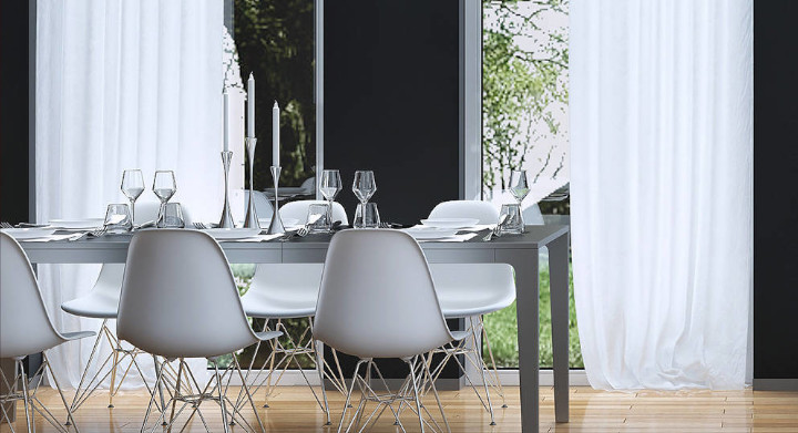 SCHOTT produce a wide range of materials and products for the home White modern kitchen with black appliances and white table and chairs