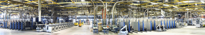 Wide shot of a large manufacturing plant	