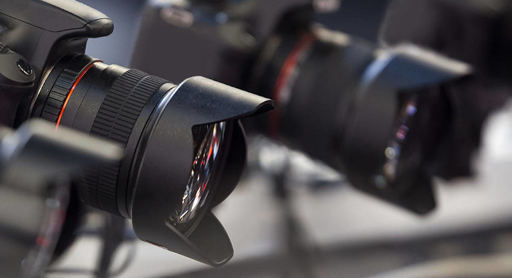 Digital cameras and video and projection equipment use a broad range of SCHOTT materials and components Row of digital cameras pointing in same direction