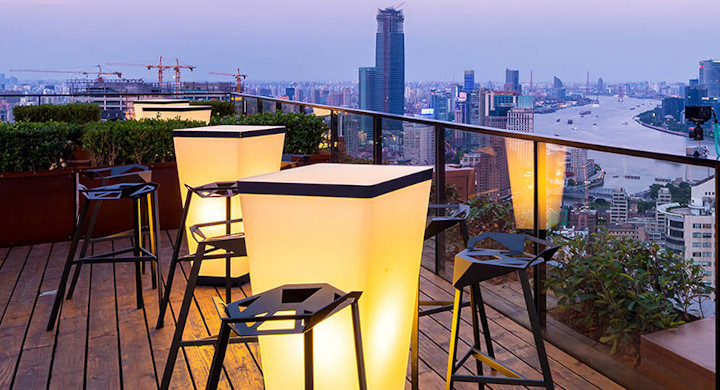 Rooftop bar looking out over a city