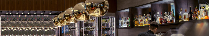 Luxury bar with barman and bottles