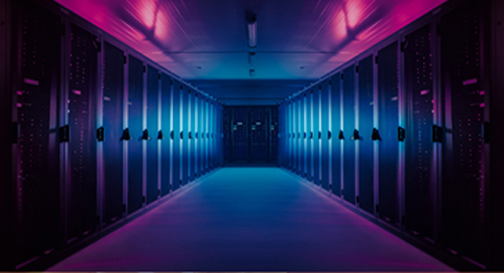 SCHOTT specialty materials for high performance computing (HPC) Row of high performance computers bathed in purple light