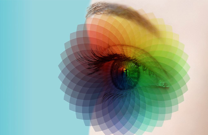 Illustration of a female eye overlaid with color spectrum