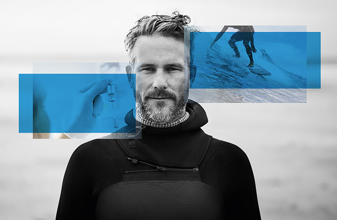 Black and white image of man in black top with blue rectangles