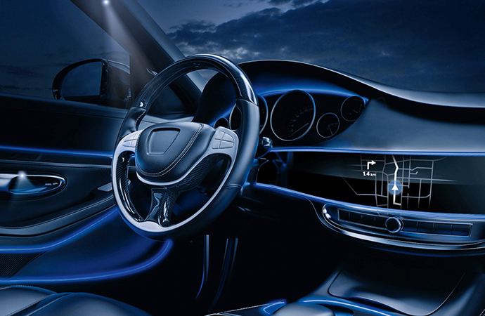 Interior of a luxury vehicle with blue SCHOTT contour lighting	
