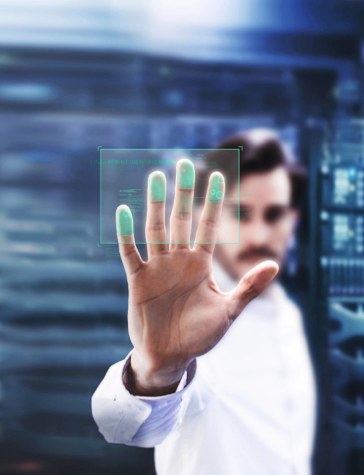 Man placing fingers on glass with green fingertips