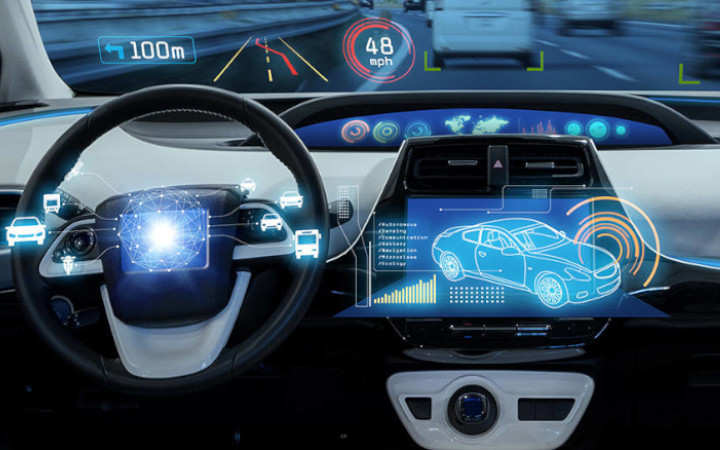 Interior of a vehicle showing the dashboard outlined in blue contour light