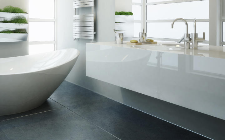 White modern bathroom with free-standing bath