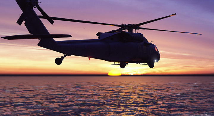 The security and defense sectors rely on SCHOTT glass materials and components Helicopters flying across an ocean into the sunset