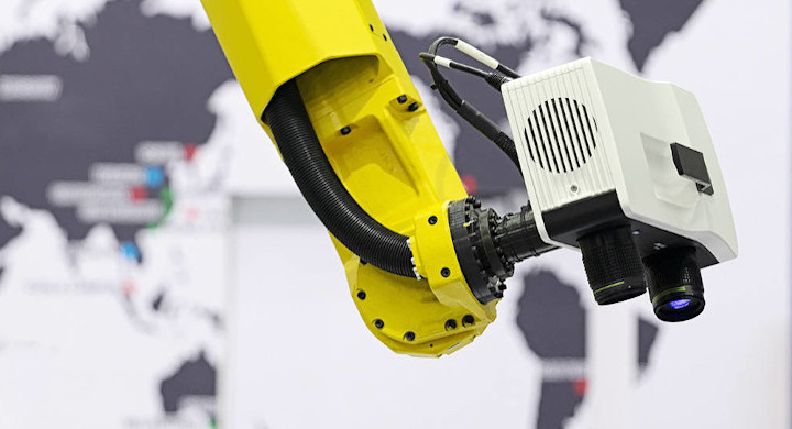 Solutions and components for automated inspection systems, process control and analysis Yellow robot arm with camera attached